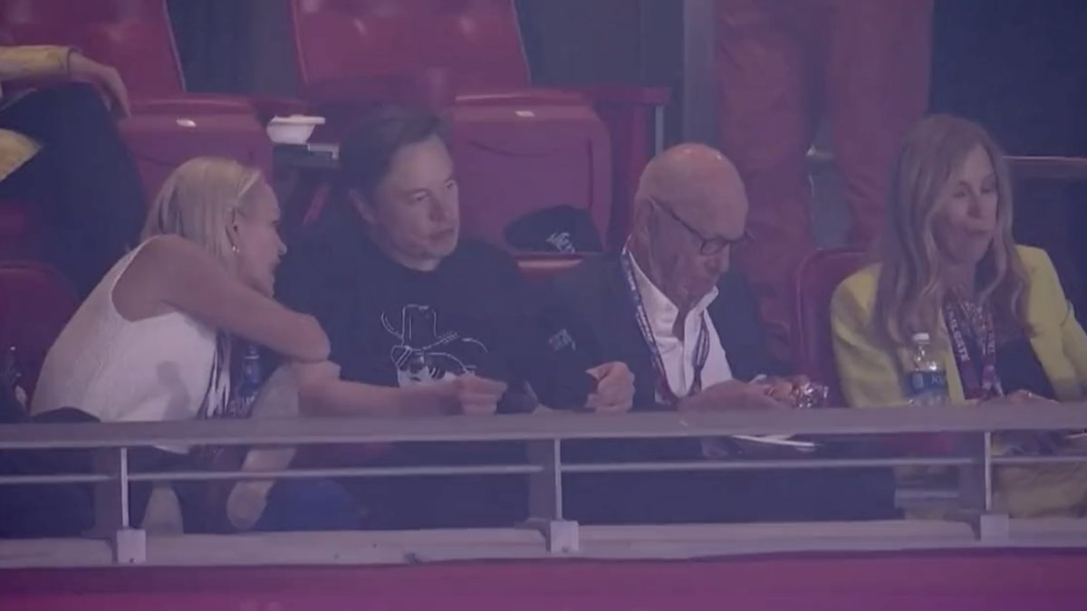 Gizmodo's tweet photo. Doxxed: Elon the Media Hater Spotted With Rupert the Media Mogul at Super Bowl https://t.co/4gUQteYJ6N https://t.co/pNuGf8LL2O