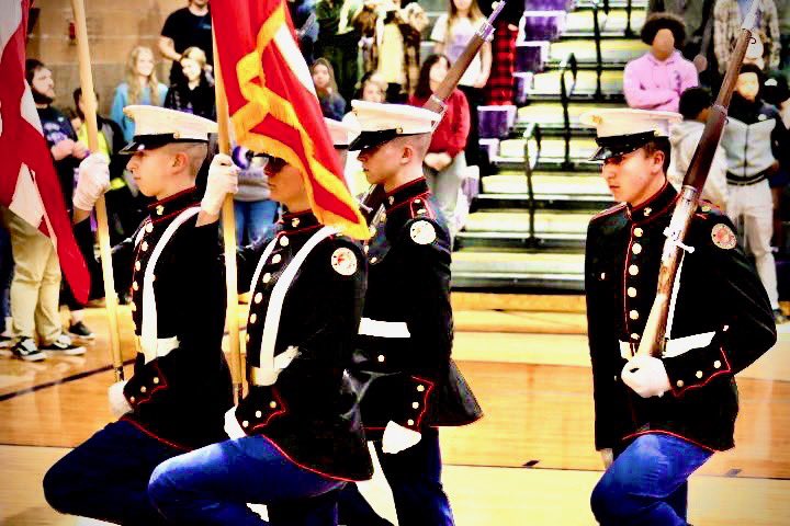 PHS_Warrior's tweet photo. Marching in honor of our country, the JRTOC drill team introduces the Courtwarming assembly on Friday, Feb. 10. Photo by Luke Wade https://t.co/gheyUQEwrG