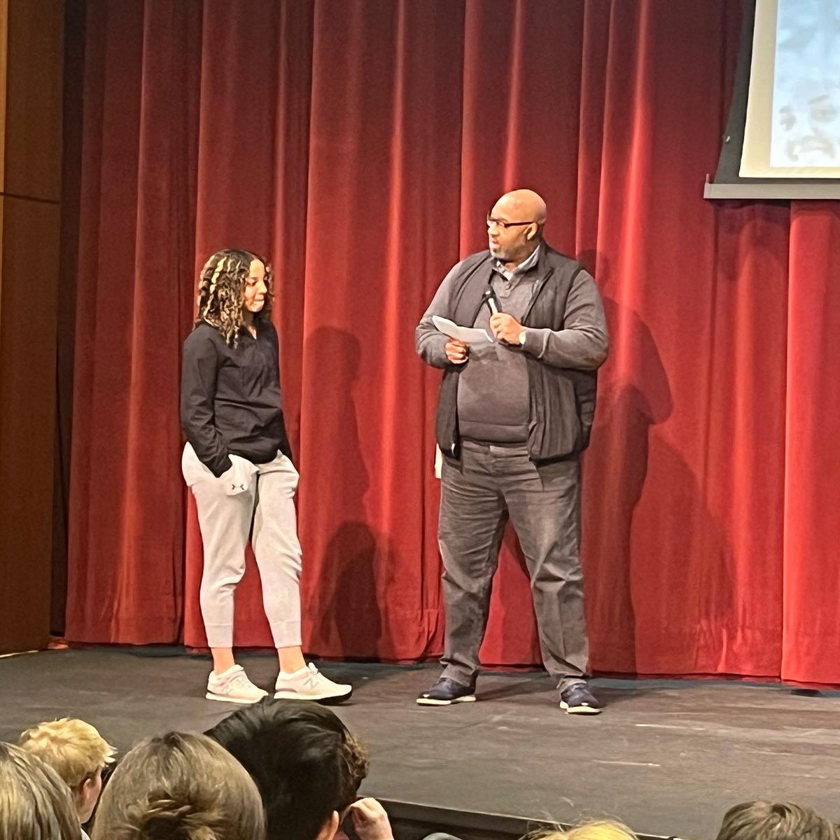 STAB senior Kymora Johnson celebrates with teammates after receiving her McDonald’s All-American jersey. Johnson is the second local ever selected as a girls McDonald’s All-American.