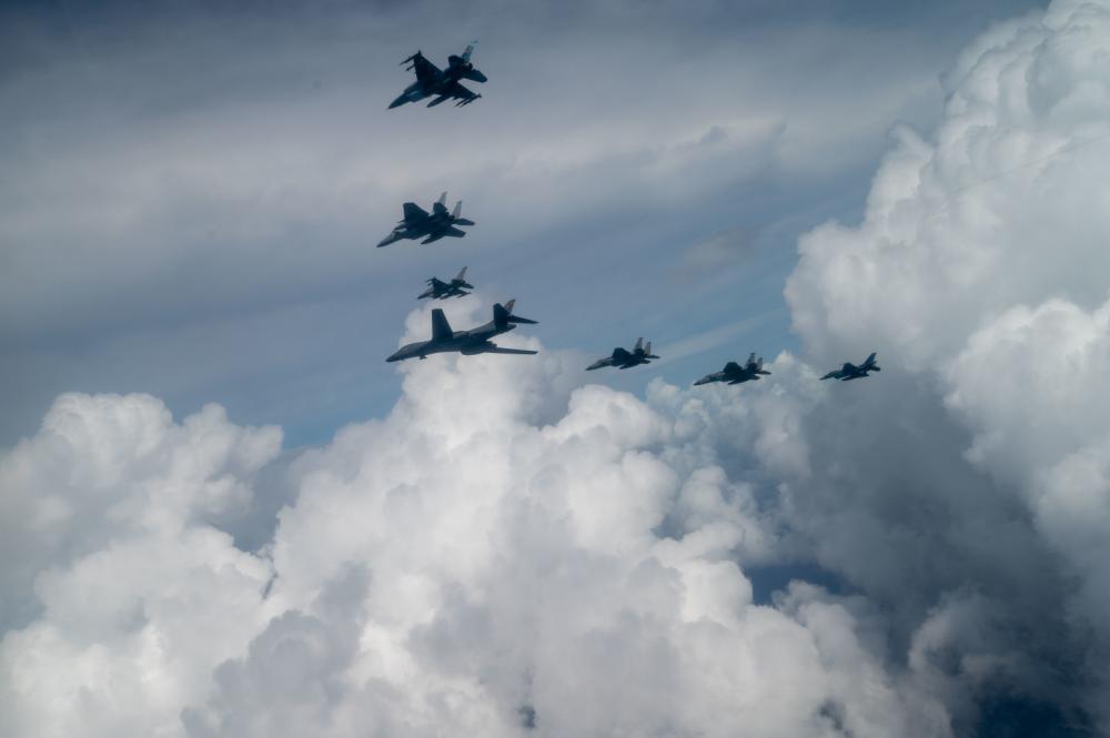 🇺🇸–🇯🇵 @PACAF and @JASDF_PAO_ENG fly in formation near 🇬🇺, for #CopeNorth23. #FreeAndOpenIndoPacific #Readiness #FriendsPartnersAllies 📸: SSG Charles T. Fultz
