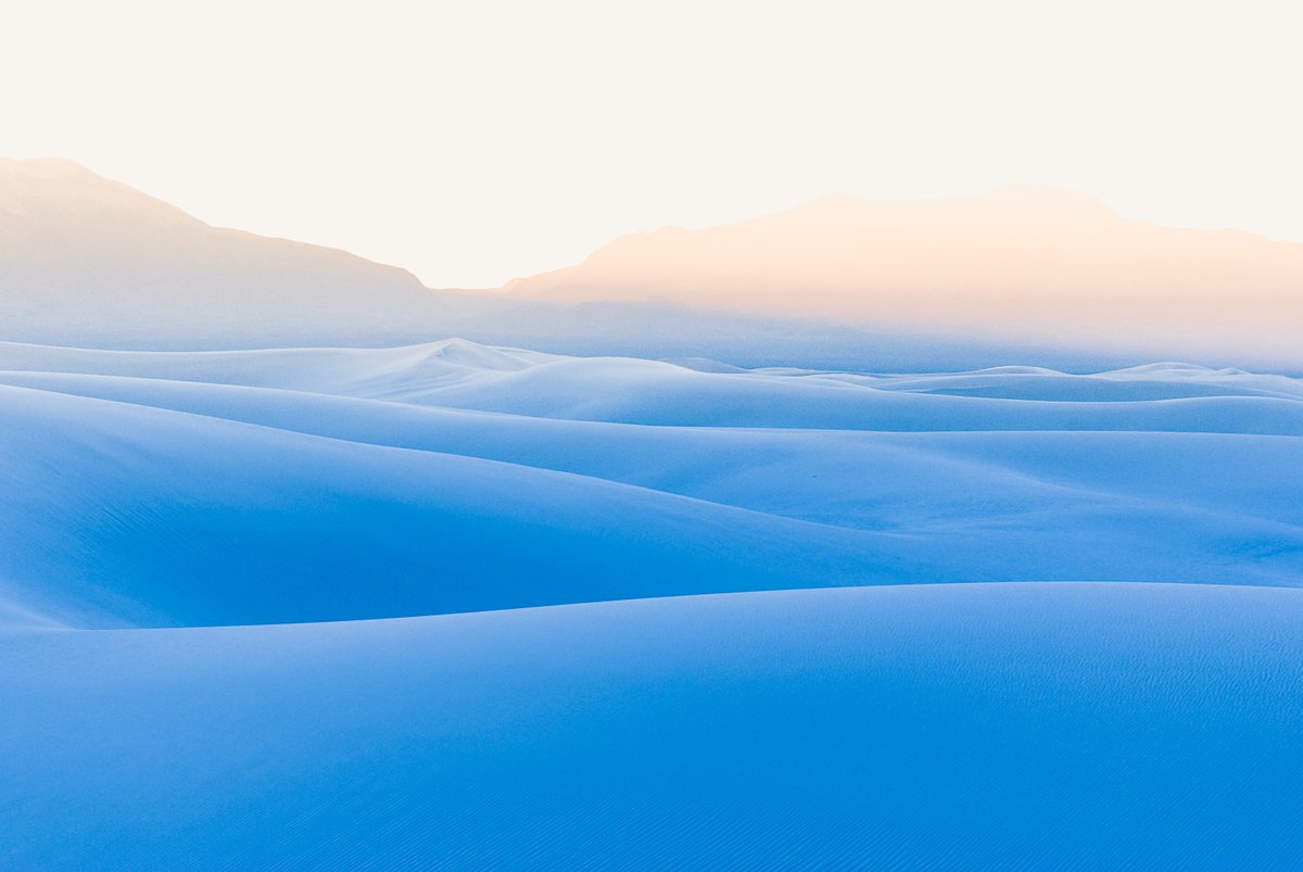 Interior's tweet photo. Rising from the heart of the Tularosa Basin is one of the world's great natural wonders — the glistening white sands of New Mexico. At White Sands National Monument, great wave-like dunes of gypsum cover nearly 300 square miles of desert.  

Photo by Mitch Warnick https://t.co/NSbqEcSNYK