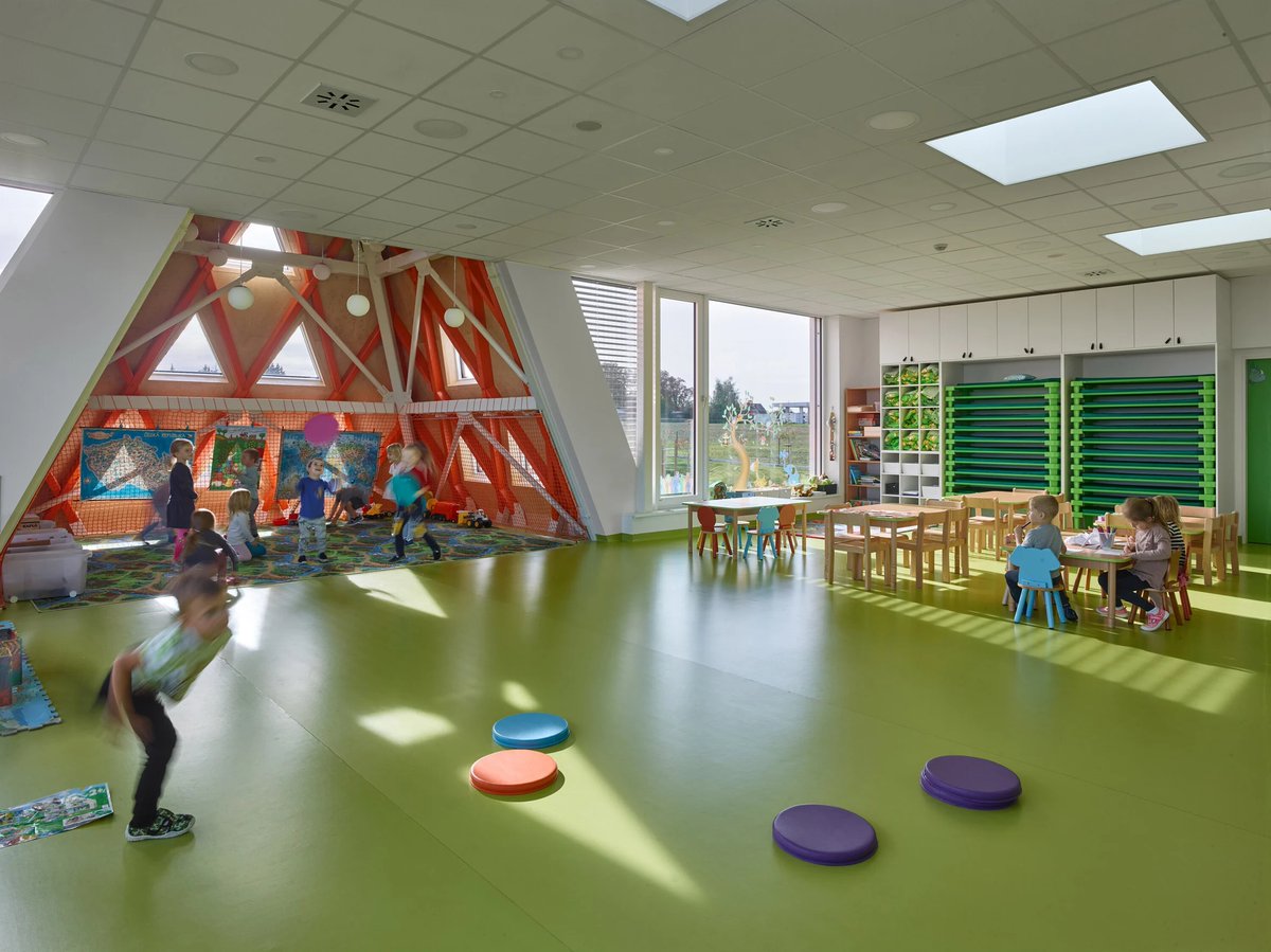 dezeen's tweet photo. Architektura draws on "children's spontaneity" for Větrník Kindergarten in Czech Republic: https://t.co/VSXEnzT8wz https://t.co/Hs3xFWfxaE