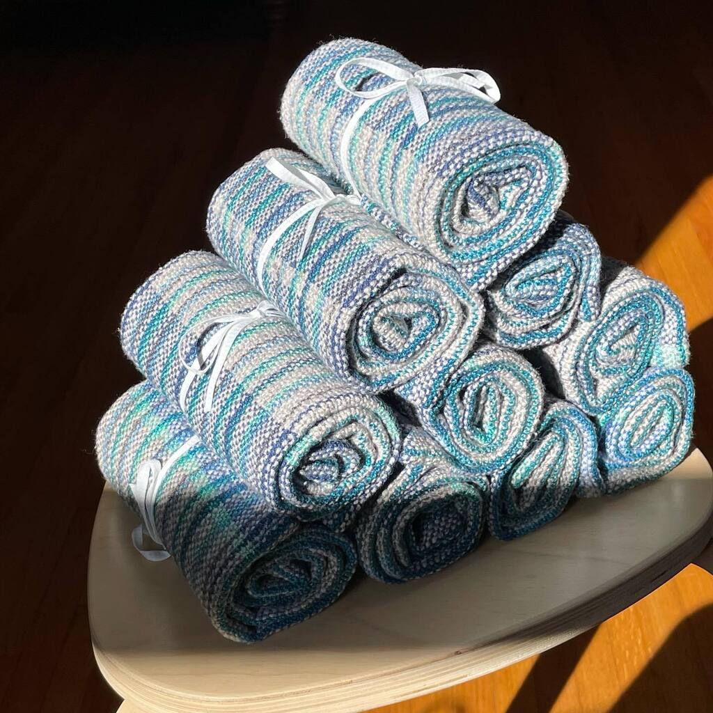 dulcey's tweet photo. I wanted to give individual gifts to a group of people. This is likely the longest warp I have ever created. After weaving, I had 8 1/4 yards of handwoven material. Here are the ten cotton hand towels I made, pictured in (and not in) a lovely winter suns… https://t.co/C3uiPBo6uI https://t.co/0S2kNMDzJM