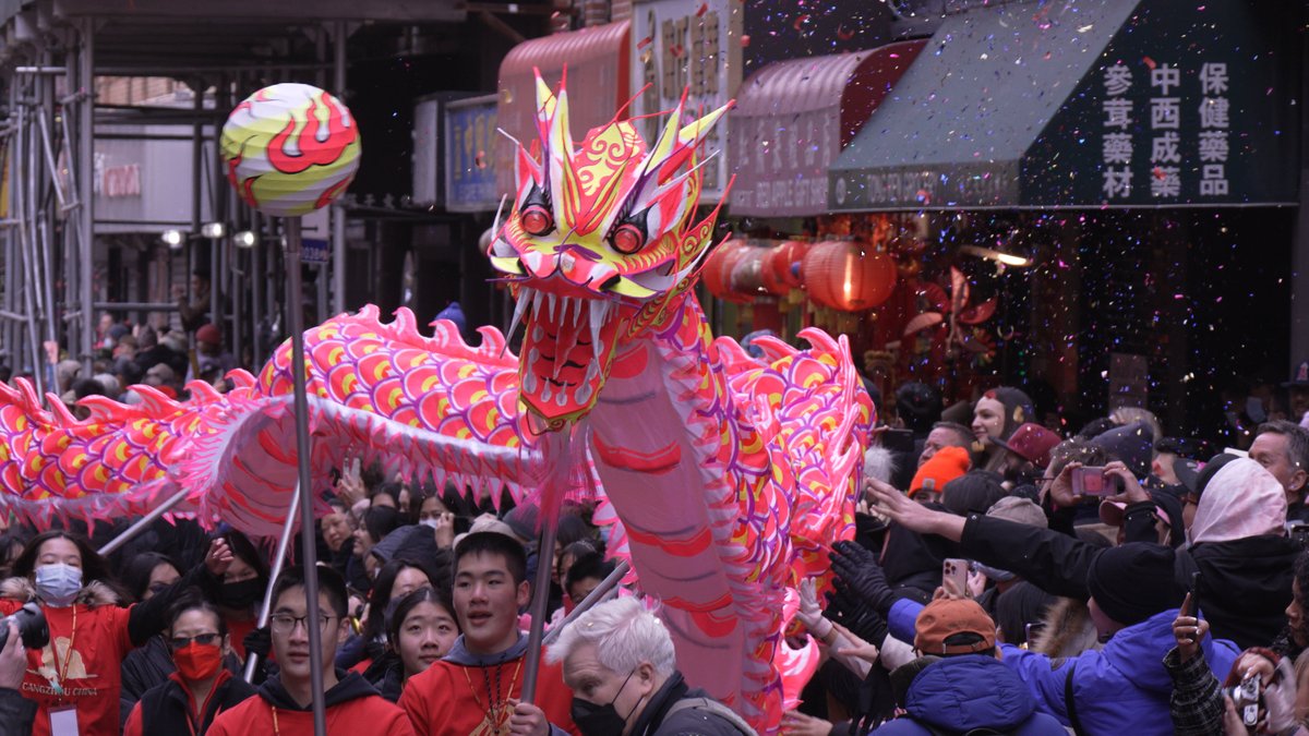 NYC Chinatown Lunar New Year Parade 2/12/23. The ball the dragon is following is called the 'Pearl of Wisdom', representing the dragon's search of eternal truth. #lunarparadenyc #NewYorkStreet