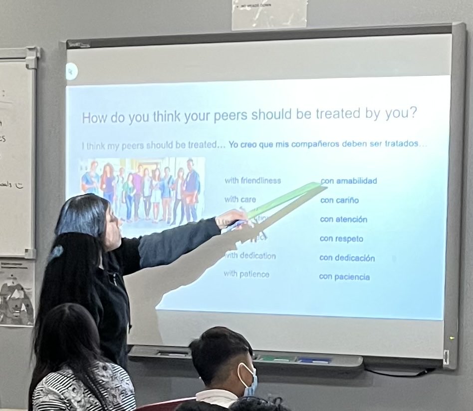 Tracking the print. Every time we are reading in our class, #mll #newcomers #slife students are tracking. Here, a student is LEADING our class in chorally reading our social contract. ⁦@DrCarolSalva⁩ #BoostingAchievement