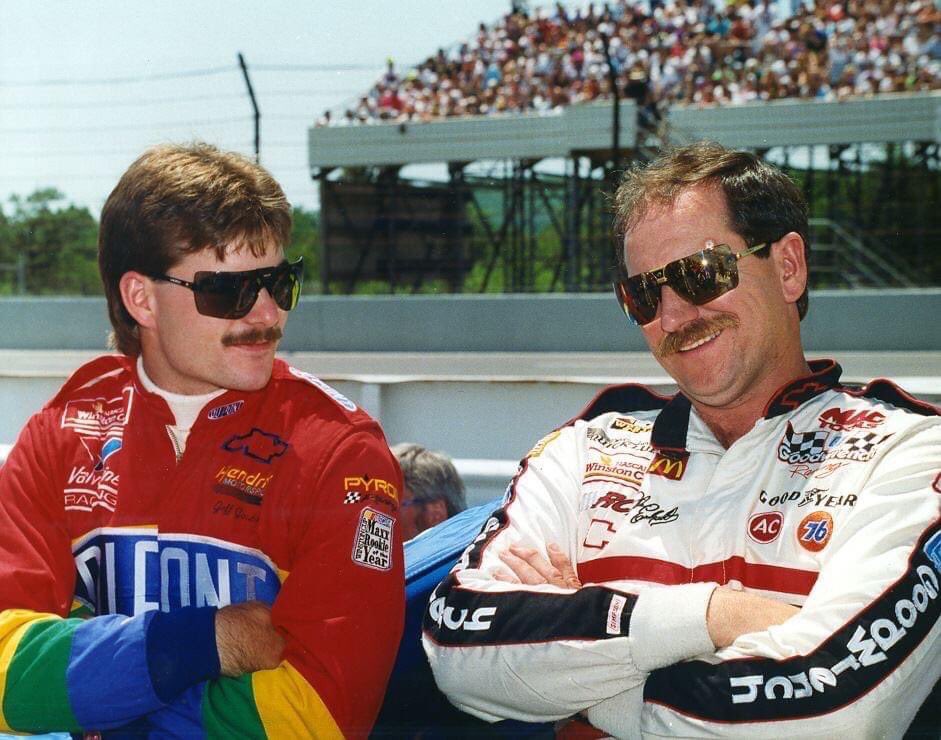 Jeff Gordon hanging out with Dale Earnhardt prior to the start of