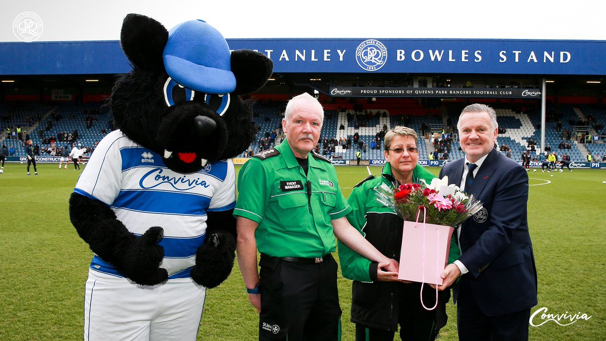 💐 We wished couple and volunteers Dawn and Dave a Happy Valentine's Day on Saturday.
 
Thank you to all <a href="/stjohnambulance/">St John Ambulance England</a> staff for keeping R's supporters safe throughout the season 💙🤍
 
#QPR | #EFL