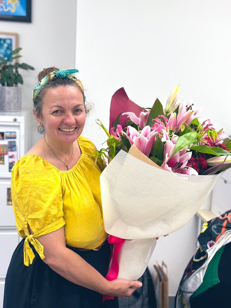Our fearless leader receiving flowers from her predecessors - we all love our Principal Lade at Alex Park