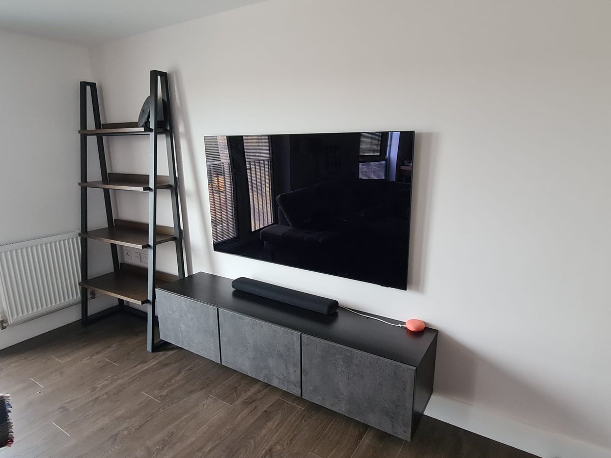 TheAerialManUK's tweet image. A nice new TV installed without cables showing gives a clean finish. Boxes hidden in the unit below. 
#tvinstallers #tvinstallation