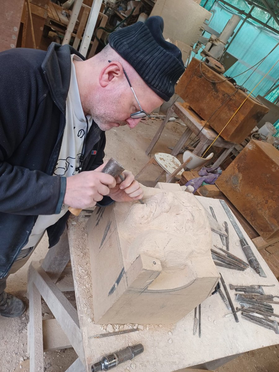 ClivedenConserv's tweet photo. Master carver Jim Kirby carving a replacement bath stone grotesque at our conservation workshop for the Deer Park Bridge, @WindsorGtPark @TheCrownEstate 
#stonecarving #carving #bathstone #windsor https://t.co/4bruWv3tfR