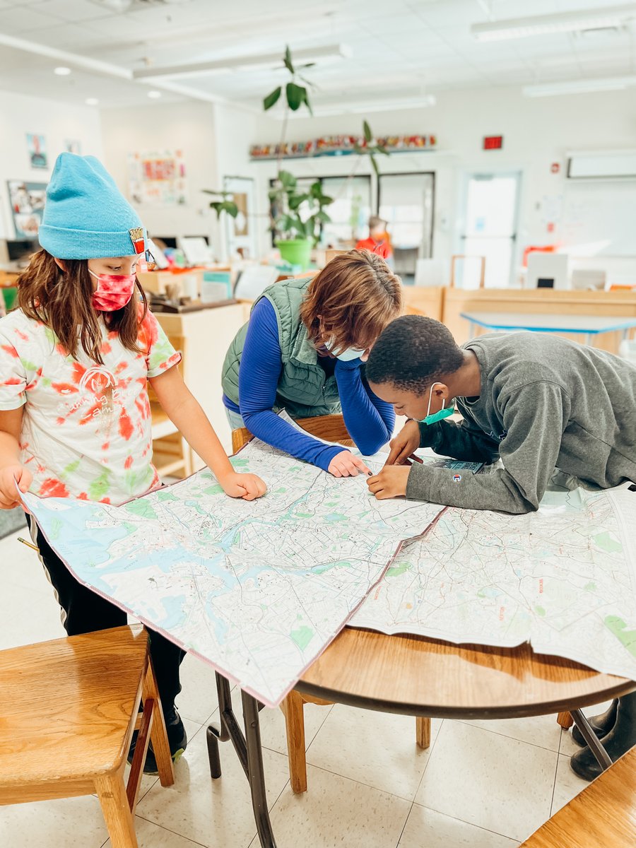LexMontessori's tweet photo. Two Upper Elementary students work together with their teacher to learn the ins and outs of reading a map. This skill will come in handy during their big class trip to D.C. this spring! #IamLMS https://t.co/0HhoTpWlZp