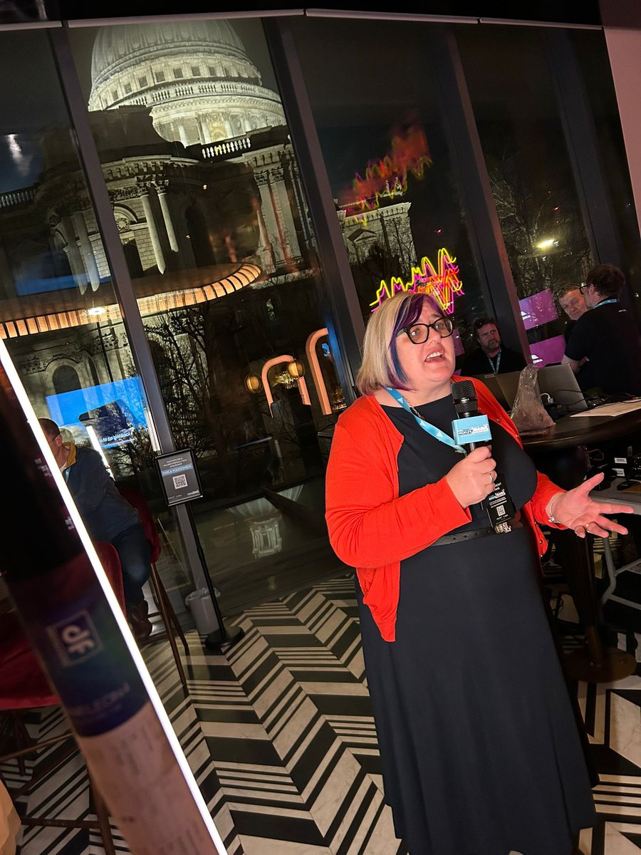 Sareyware's tweet photo. Some photos that Simon took of me chatting to the camera about my love of @McLarenF1 at the #velopeoplespaddock event last night. I look like Iโm singing in those last two! ๐คฃ๐ค๐งก https://t.co/hcgdXB81W7