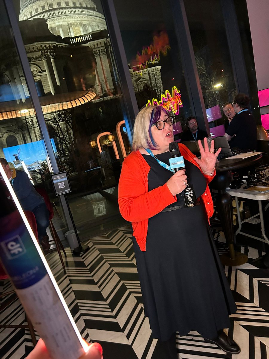 Sareyware's tweet photo. Some photos that Simon took of me chatting to the camera about my love of @McLarenF1 at the #velopeoplespaddock event last night. I look like Iโm singing in those last two! ๐คฃ๐ค๐งก https://t.co/hcgdXB81W7