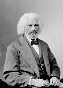 Portrait of older Frederick Douglas with a bow tie.