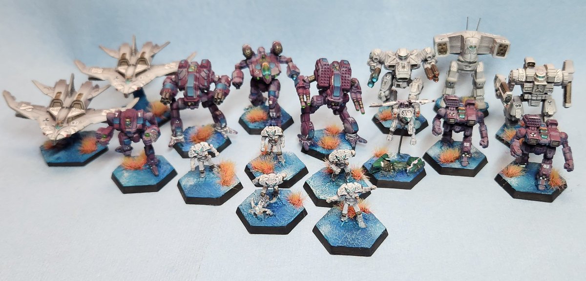 Crackerbox227's tweet photo. Recently finished up with some Clan Snow Raven models that I've been working on for games at Adepticon, plus my Wusun Omnifighter model. I love working on models with art from @Flyingdebrisguy because the lines are always so clear and the silhouettes are always top notch. https://t.co/QK36mCoj1F