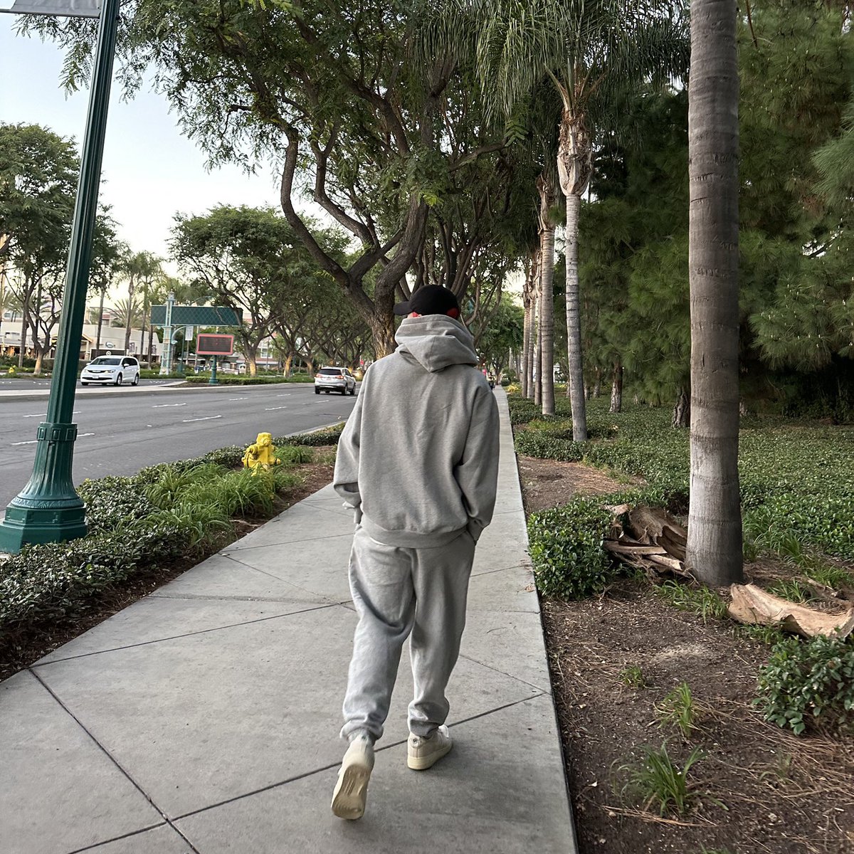 wooyoung looking very boyfriend-shaped in his grey hoodies