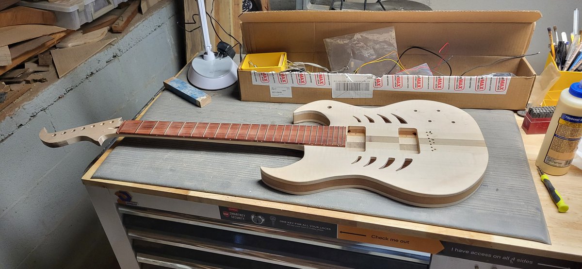 The 7 string "Thrasher" build torn down for final sanding and the start of the finishing process