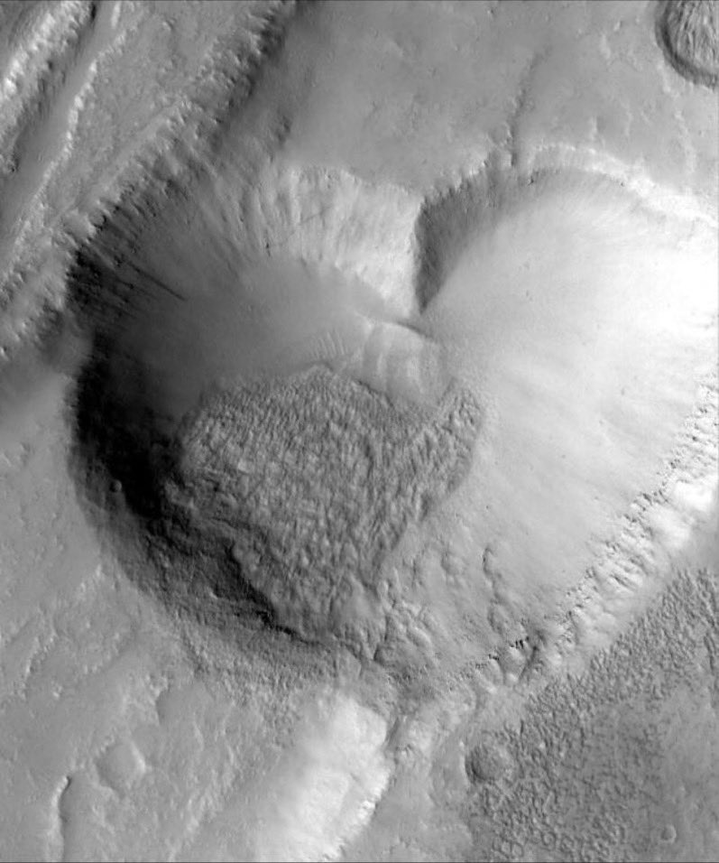 Happy Valentine’s Day 🤍🔴 A heart on a #redplanet Photo: NASA, heart-shaped pit on Mars (1999)
