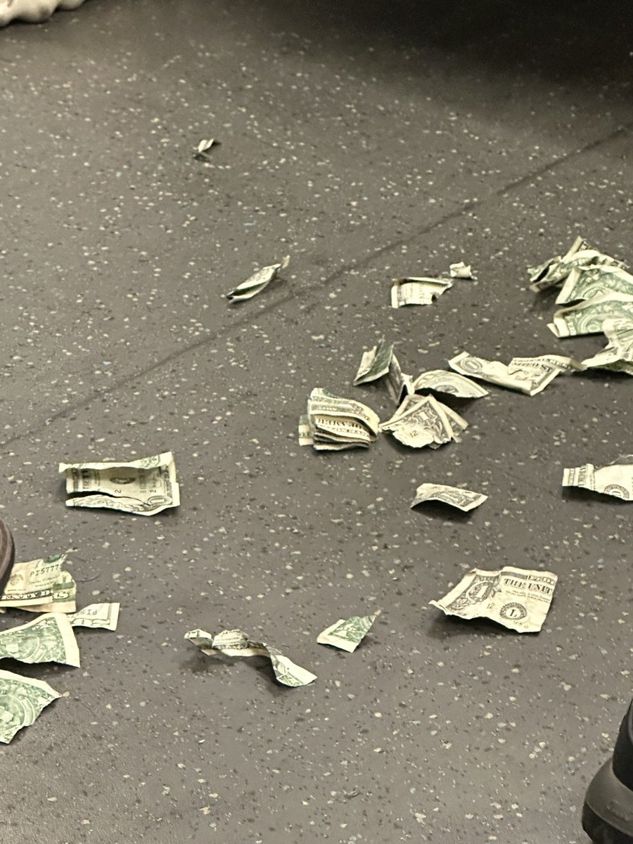 Tales from <a href="/SFBART/">BART</a>: a man just violently tore up $1 bills and exited the train at West Oakland.  Car full of passengers very confused. 

Anybody have scotch tape?