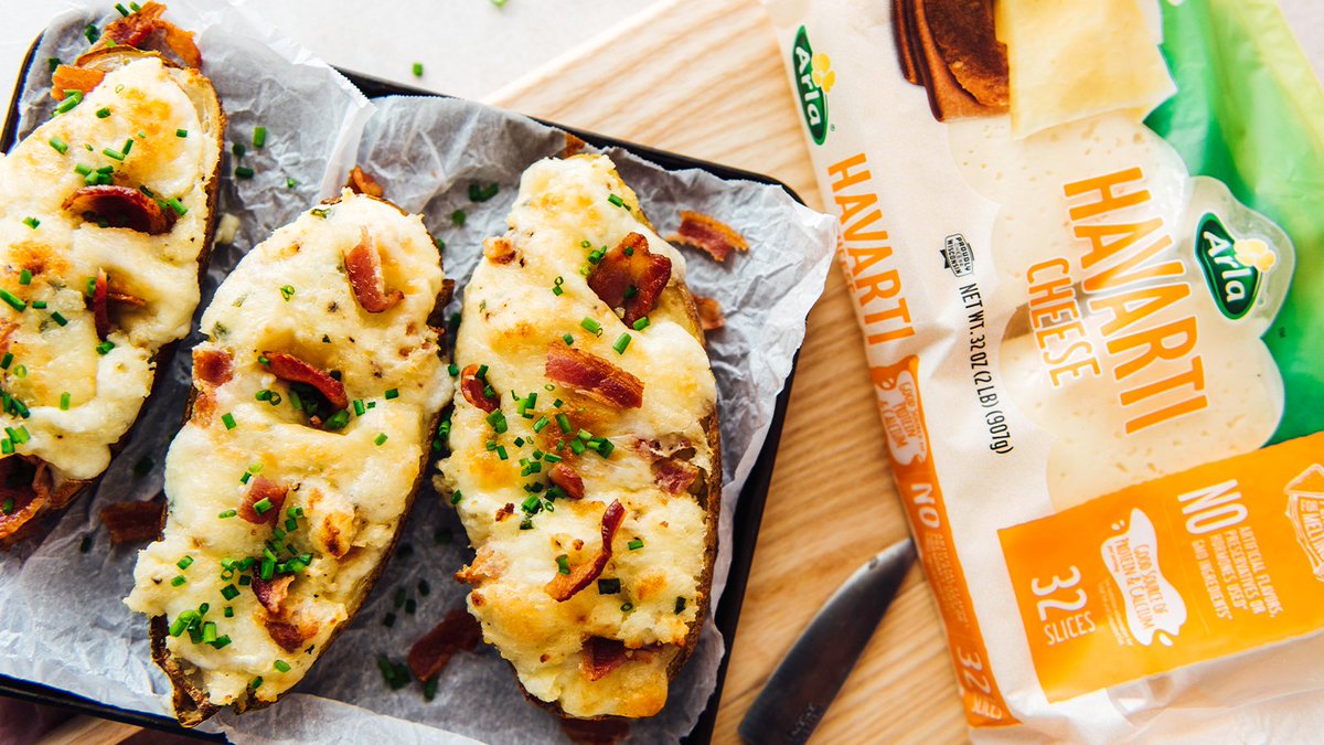 ArlaFoodsUS's tweet photo. A box of chocolates sounds nice, but decadent potatoes with creamy Arla Havarti Cheese Slices sound even dreamier. Reply to this tweet and tag who you would share this cheesy dish with! #ArlaCheese https://t.co/Ovl8kr8R4k