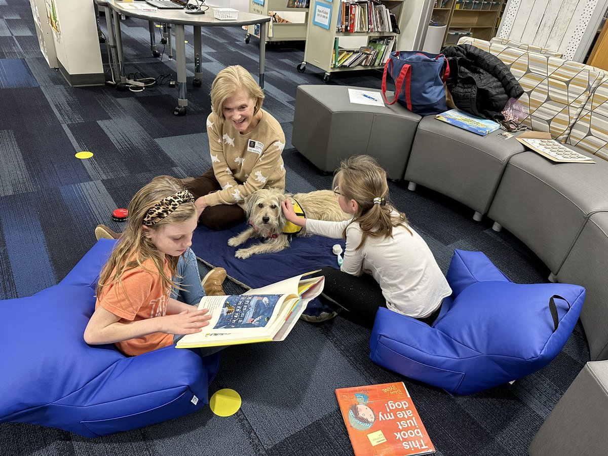 Students are excited to read to therapy dogs in the Learning Commons! Reading to a furry friend can be calming and helps nurture a child’s enthusiasm for reading. #OCT4u #campOCT