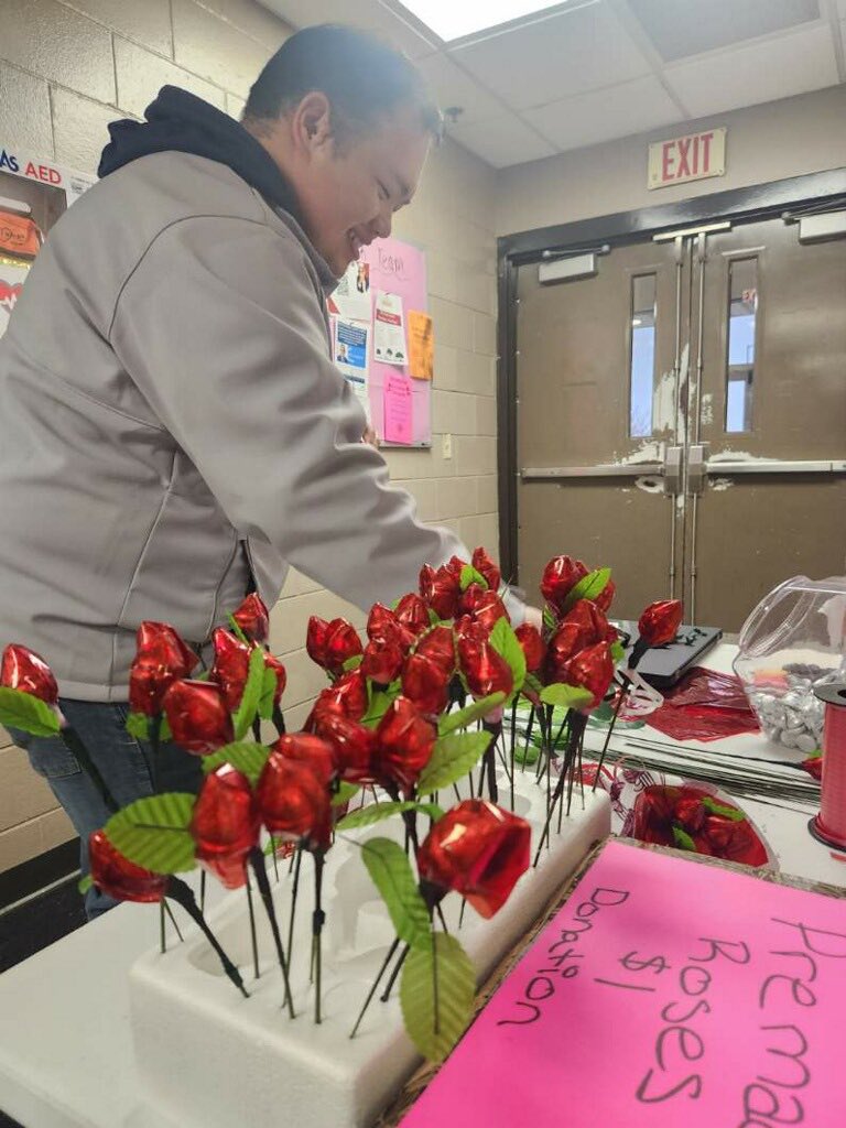 Johnsonville's tweet photo. This is the Johnsonville Way in action! Alex & others made 500+ of these candy #valentine roses to raise funds for a fellow member’s family who lost their home to a fire. #JVLWay #ValentinesDay https://t.co/IucPqKSWIp