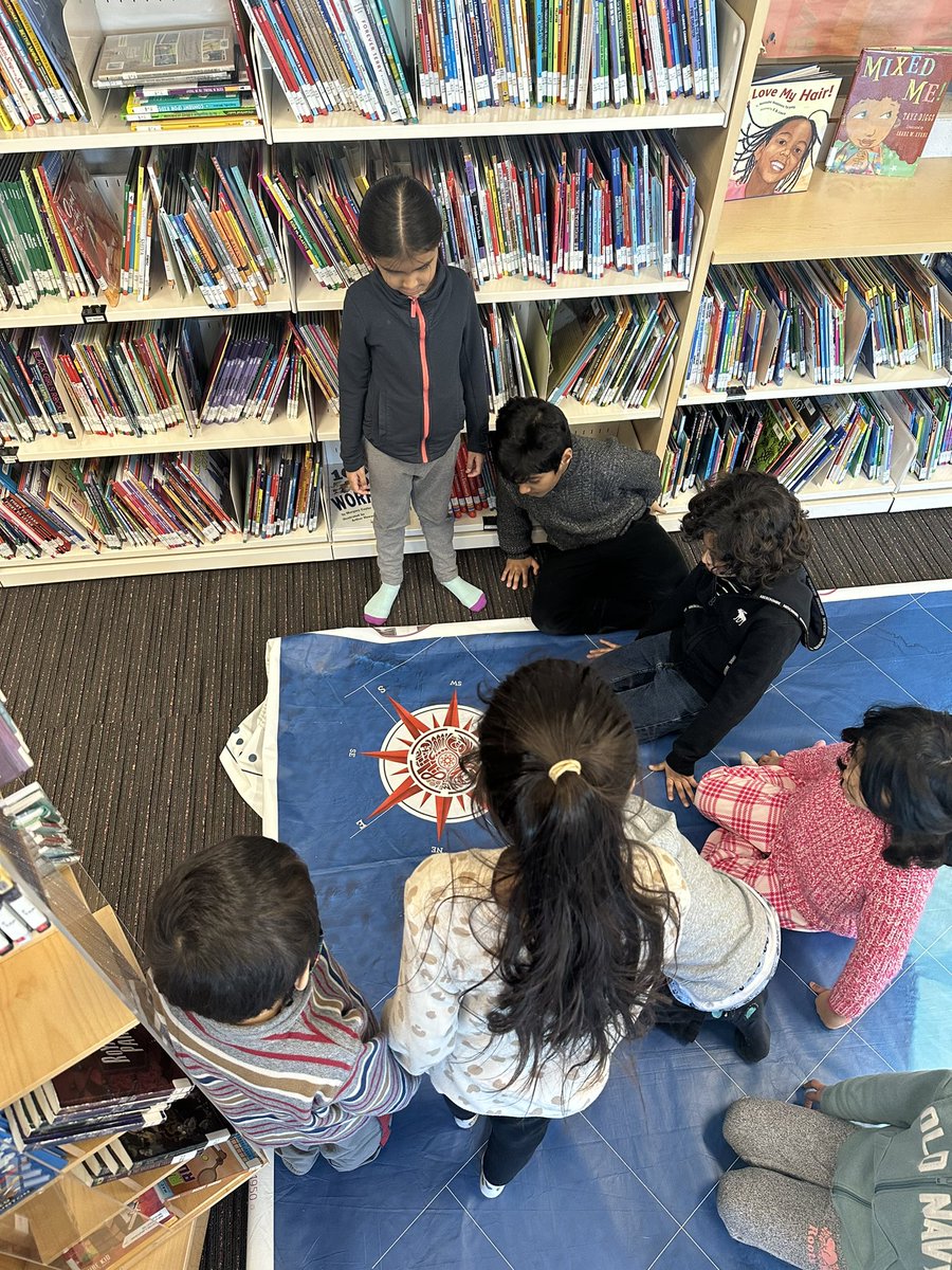 msalyssaleroy's tweet photo. 1B students really enjoyed exploring the gigantic map in the library! They learned more about how a compass can be used for direction and how to identify land and water on a map. Thank you @AJackmannTL for this amazing experience! @TonyPontesPS https://t.co/P1846bCXXy