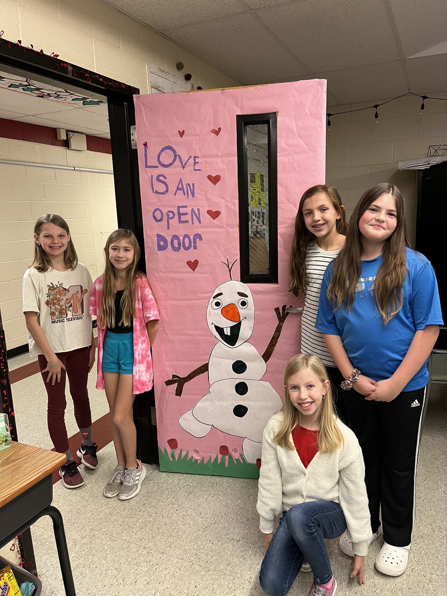 PamRountree's tweet photo. My Interior Designers & Hospitality crew has done it again with another amazing door! Happy Valentine’s Day! ❤️ #lovemyclass #rountree5th #freyelementary #freyflames https://t.co/VqbQG583mz