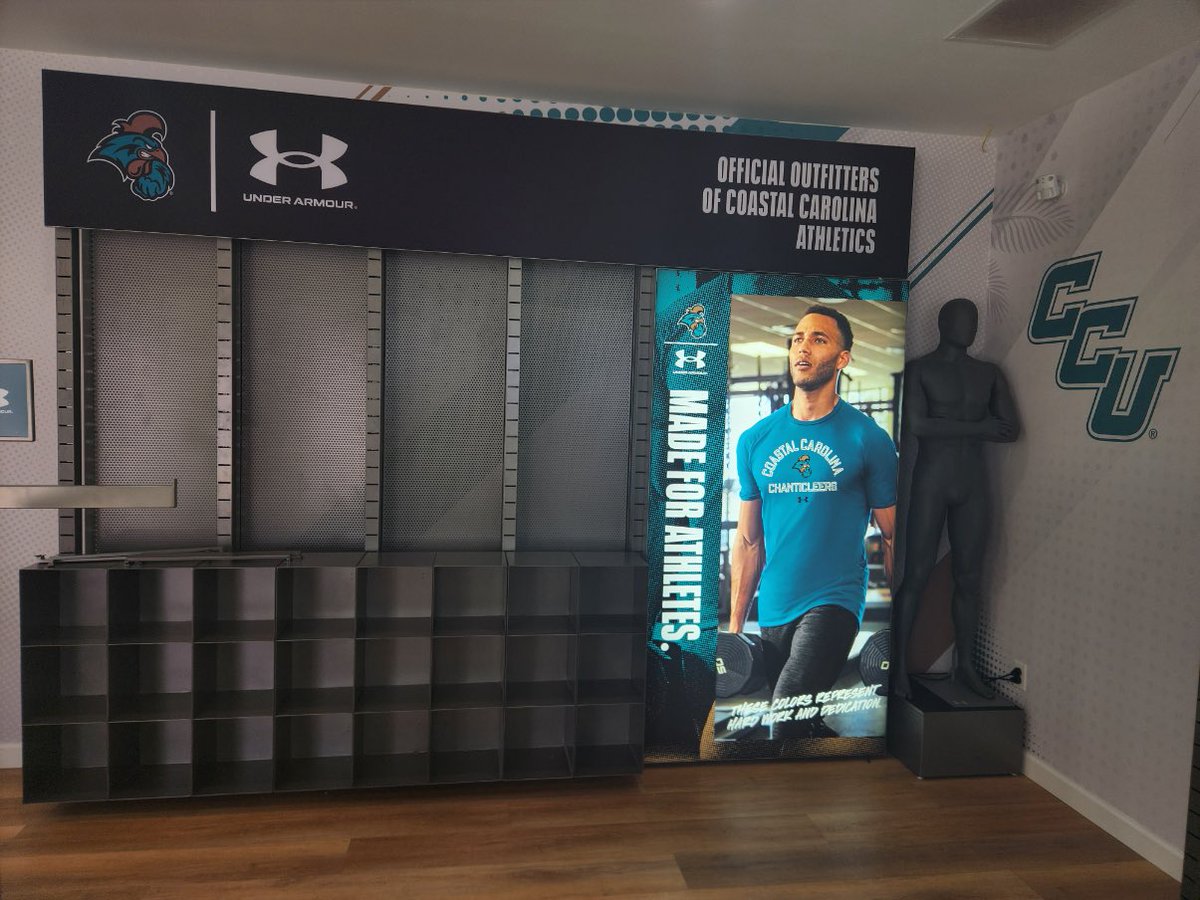 michaeltbenson's tweet photo. Afternoon update on the #TealNation store: first round of fixtures in place, additional wall wraps going up, and new @UnderArmour merch will be on shelves soon. 

👀 keep an eye out for more looks and #GrandOpening date 🔥🔥🔥 @GoCCUsports @CCUChanticleers https://t.co/ka9kYSKaw2