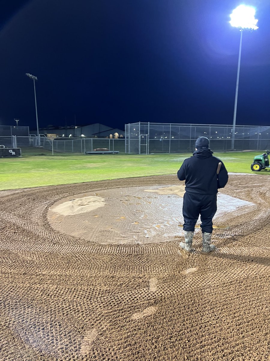 Lonnie_R_White's tweet photo. Trying to get this field ready for playing some baseball in two days! It’s cold and wet, but it Has to be done. #WeAreGR ⁦@GRHSBaseball⁩ https://t.co/tF2E4nR34g