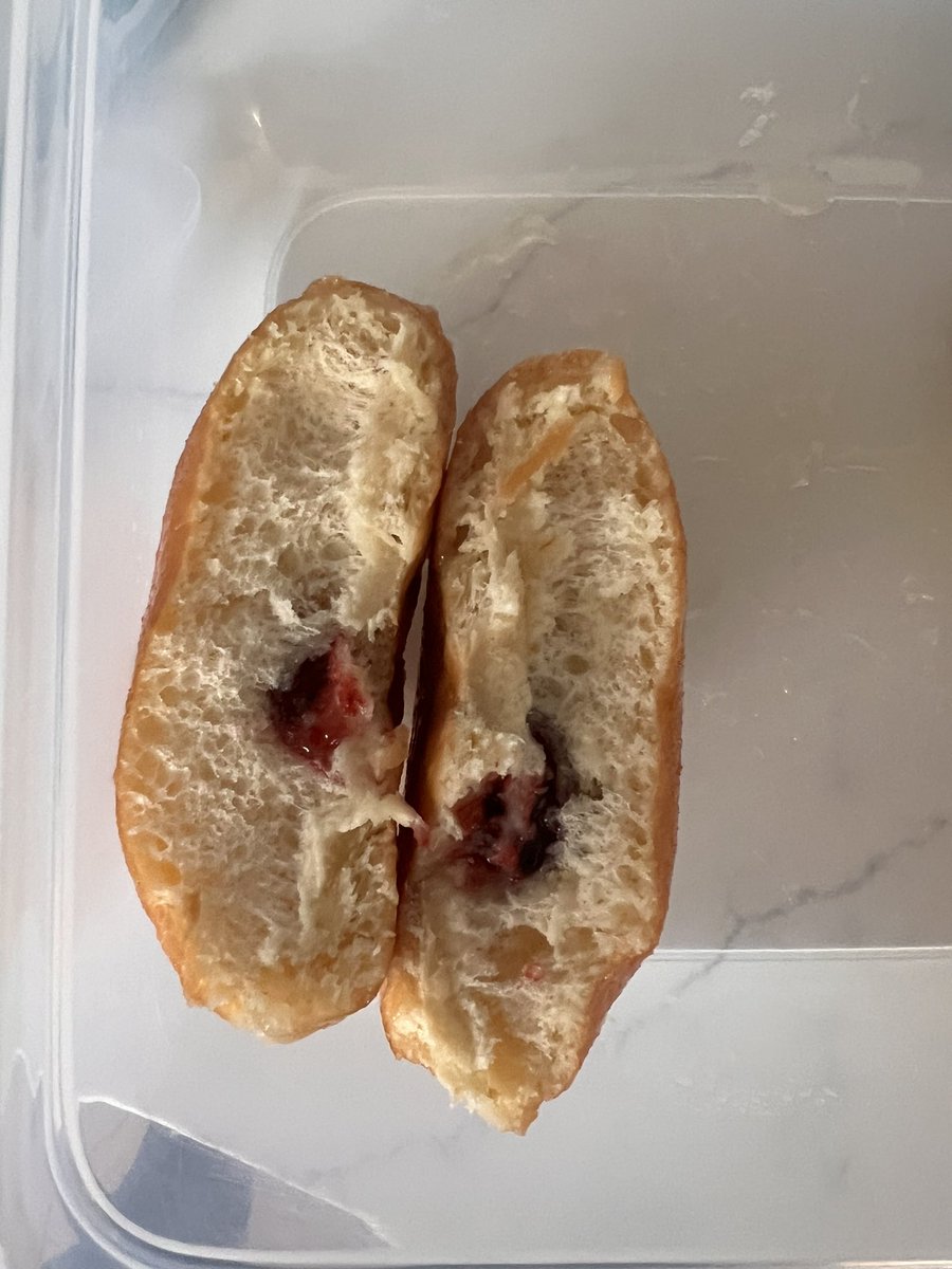 MichaelWeisel's tweet photo. Seriously @dunkindonuts?? My daughter spent her hard earned money to buy me some donuts for my birthday and this was the jelly donut. There’s supposed to be jelly in there. What happened to the old jelly donuts that jelly would fill your mouth on the first bite? https://t.co/e44OLYBTeo