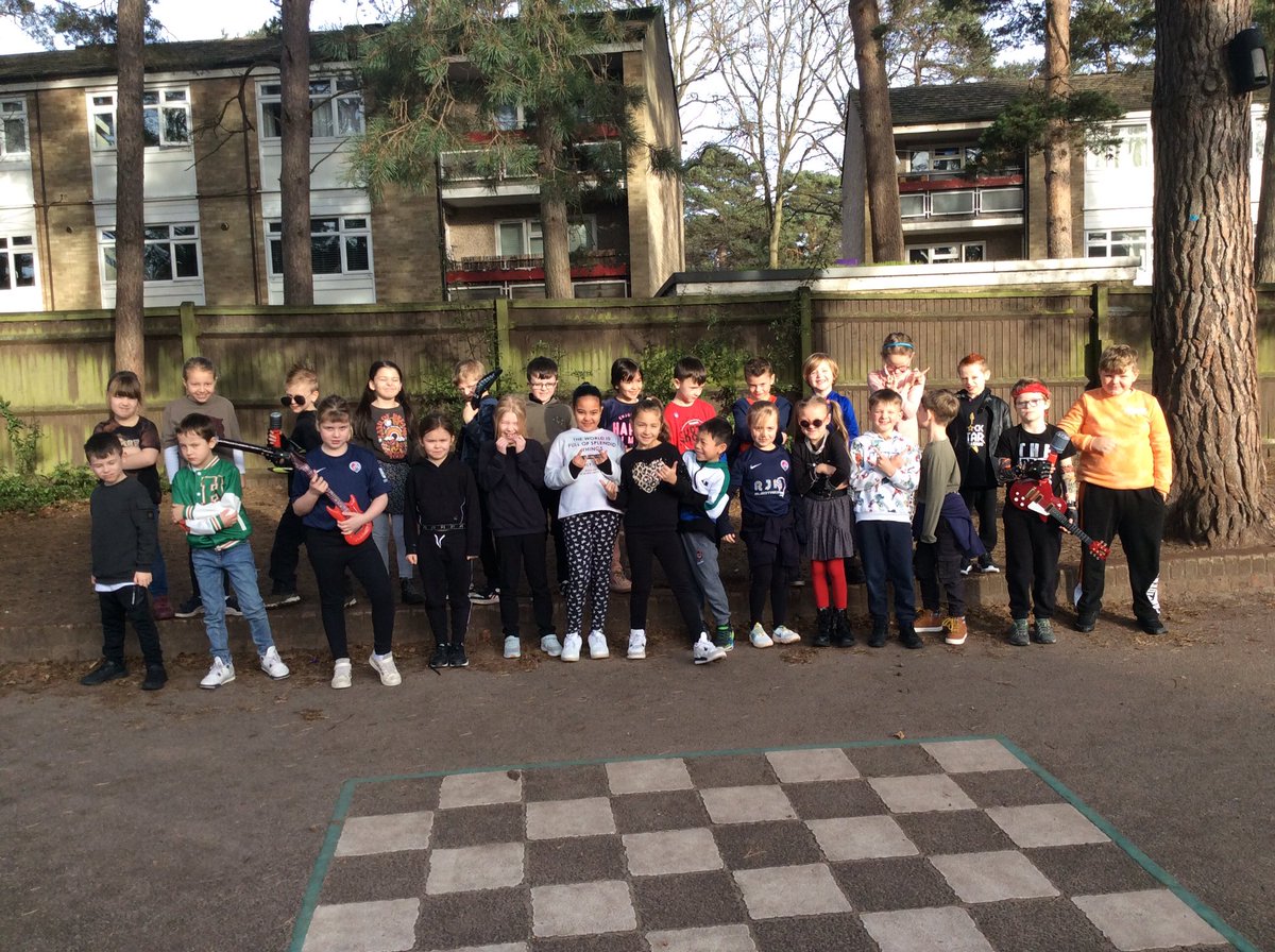 Enjoying rocking out as our Times Tables Rockstars on Number day in 3B!