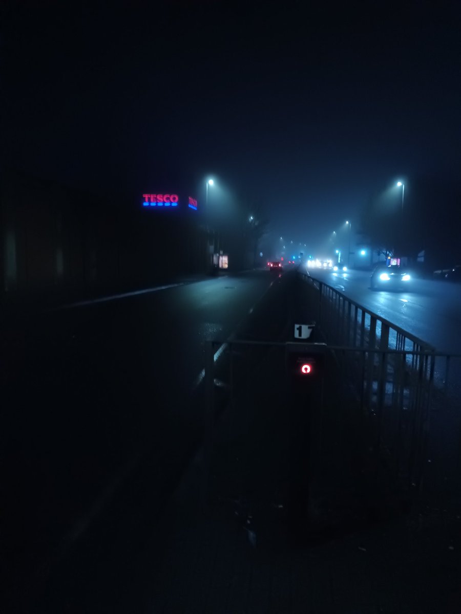 Foggy night and bright lights.

#streetphotography #streetphoto #Streetphotographs #foggy #weather #tesco #blue #brightlights #neon #misty #night #nighttime