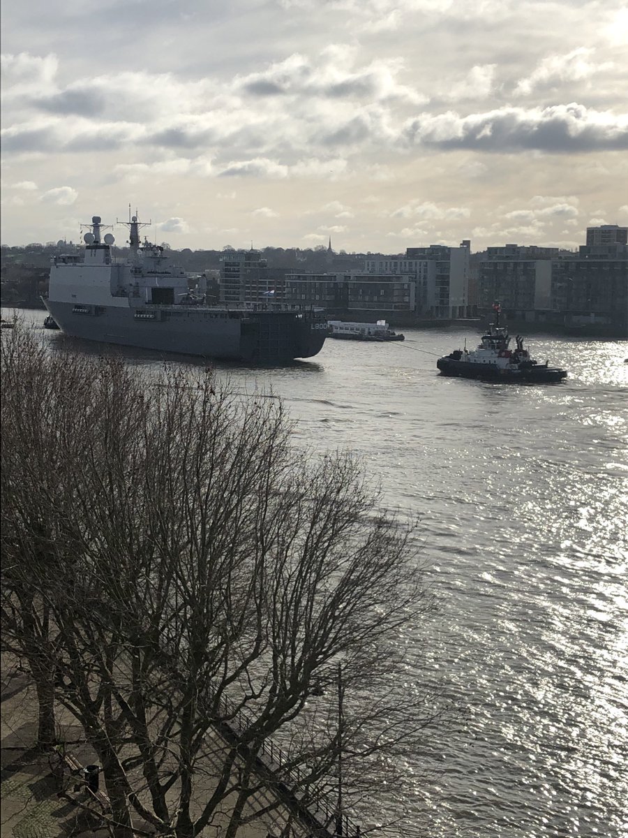 MarkEllis06's tweet photo. Warship Den Helder from the Netherlands arriving at Greenwich this morning with help from tugs Ambition and Peter https://t.co/zWJb9txjKL
