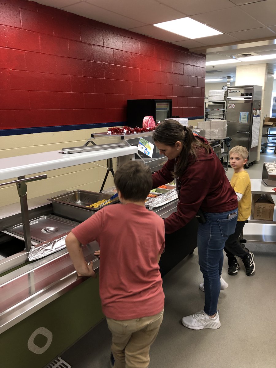 Mr. Heide and Ms. Grado jumped right in to help today at the salad bar during kindergarten and 1st grade lunch.  #eudoraproud