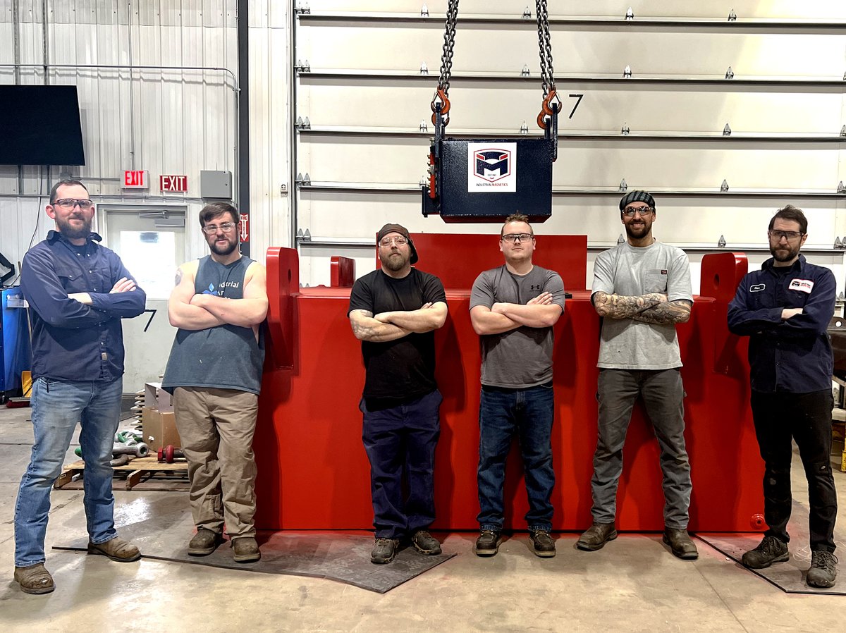 It's Fun Friday and we sure have a fun one for you today! This is the LARGEST electromagnet we've ever built with the SMALLEST version we've ever built right above it. Kudos to the team in the photo that puts in the hard work building it all. Can you guess the weight of both?