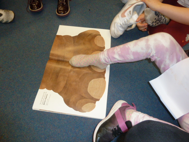 etonwickschool's tweet photo. Year 2 used the book 'Actual Size' by Steve Jenkins for #NumberDay. We compared our hand to a gorilla's hand and our foot to an elephant's foot. Then we measured the different animals parts with cubes and created a graph to display our results. https://t.co/0YK4lIi7Gz