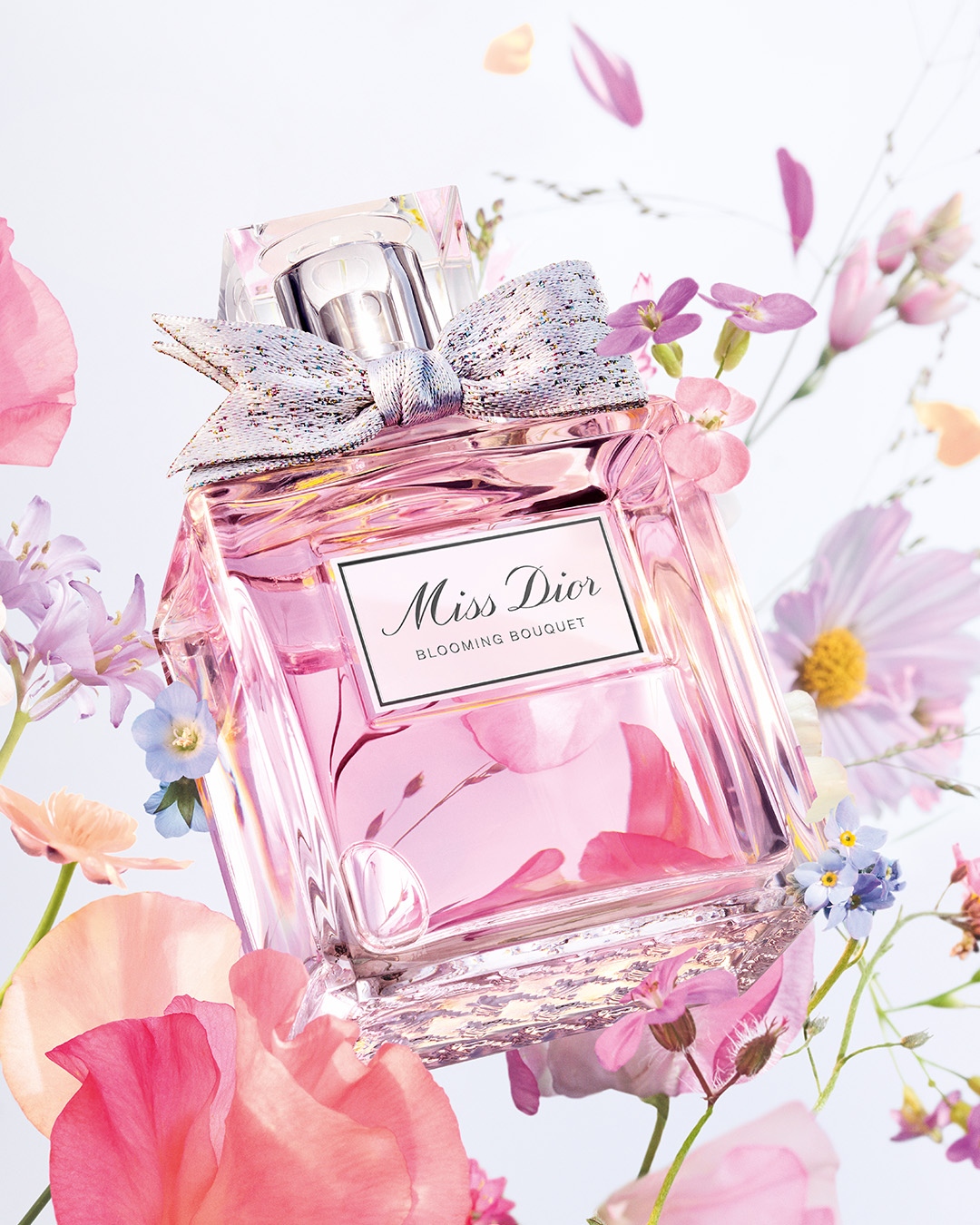 Dior on X: Let tenderness blossom. #MissDior Blooming Bouquet is a floral  composition delicately wrapped in a veil of shimmering white musks like a  soft and tender bouquet of newly bloomed flowers. #