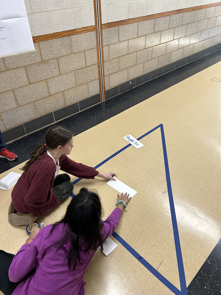 KennethDunlap1's tweet photo. We did some “hands on” constructions today using painter’s tape and the square foot floor tiles.  Great way for kids to “show what you know” about triangles and the Pythagorean theorem. @IHSchools @IHMiddle #ihpromise https://t.co/GSCzwjZin1