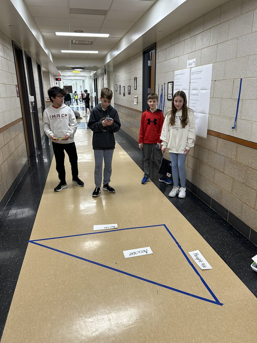 KennethDunlap1's tweet photo. We did some “hands on” constructions today using painter’s tape and the square foot floor tiles.  Great way for kids to “show what you know” about triangles and the Pythagorean theorem. @IHSchools @IHMiddle #ihpromise https://t.co/GSCzwjZin1