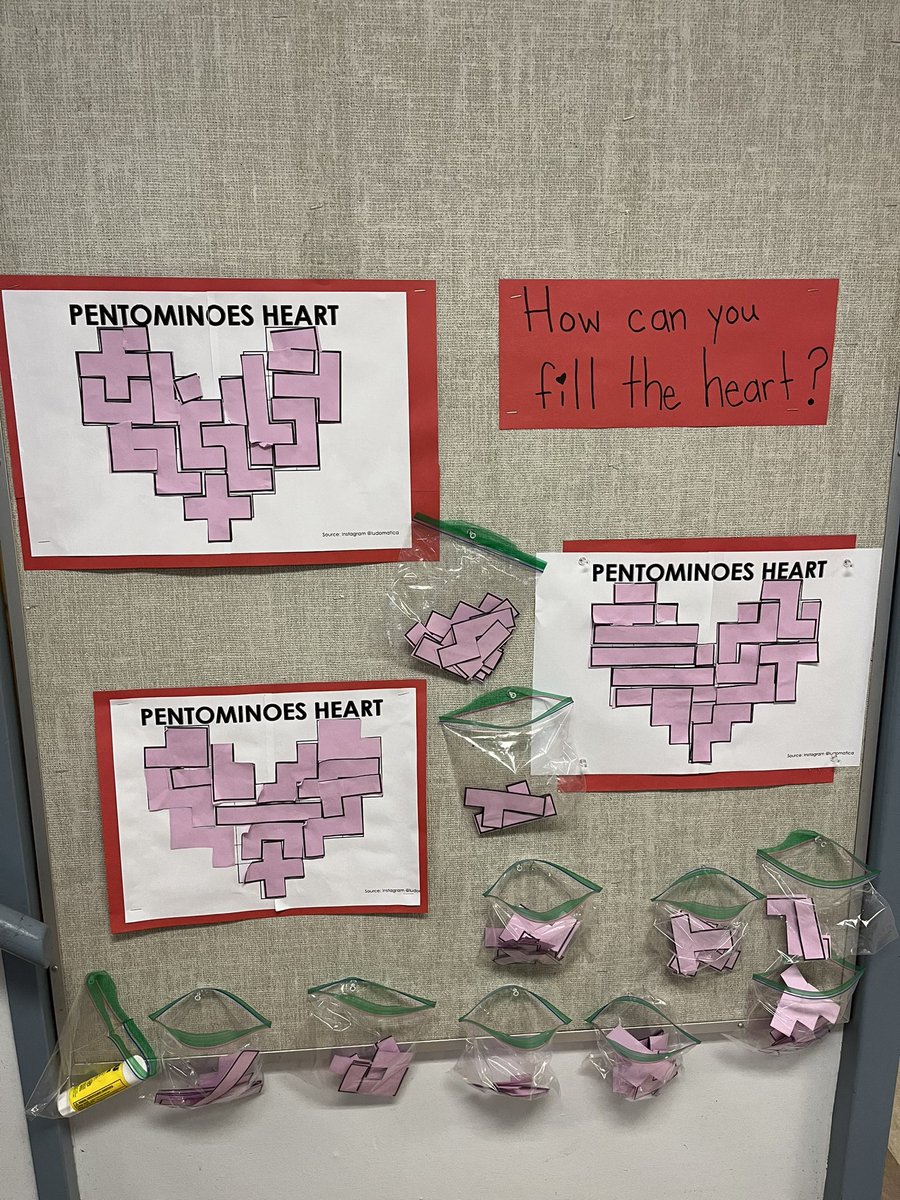 Math in the hallways. How can you fill the hearts using the pentominoes? #westvannumeracynetwork