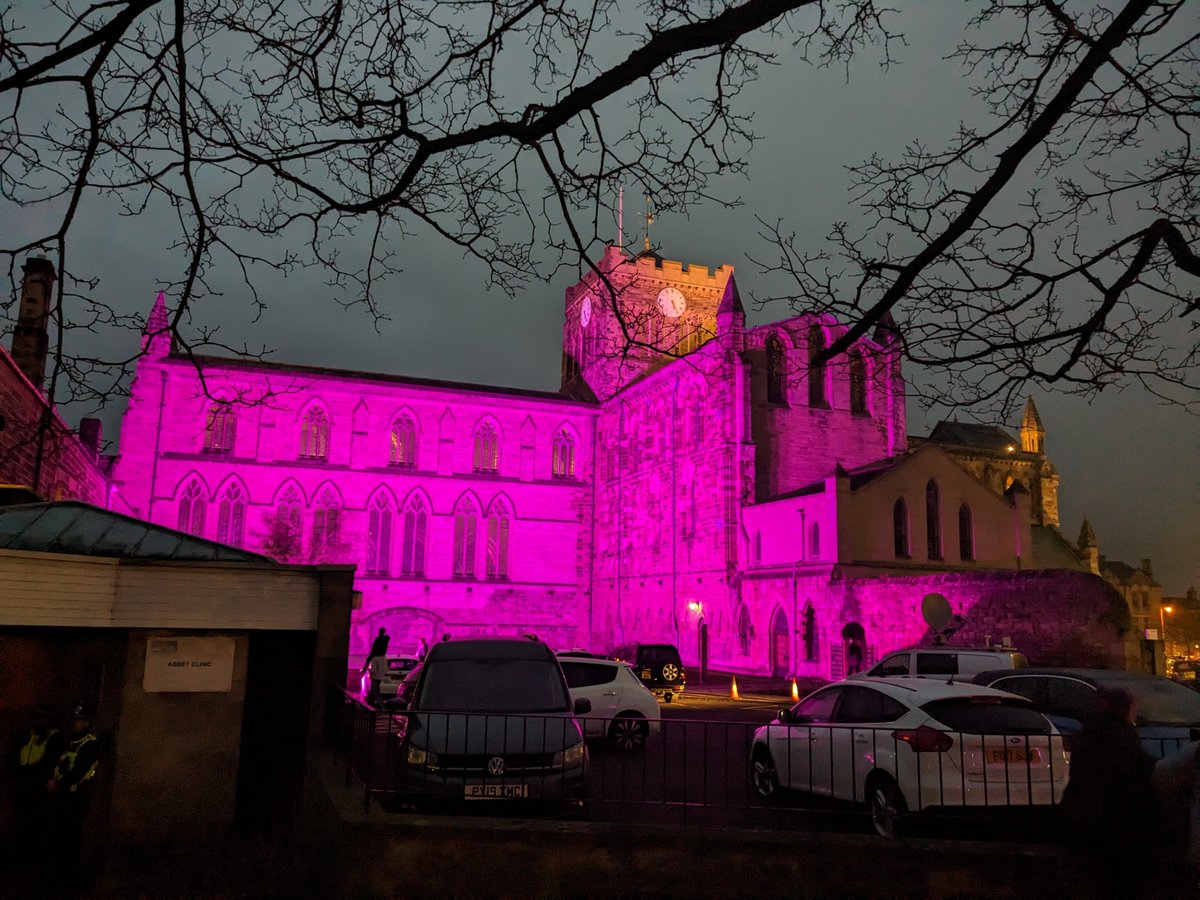 MHPaterson's tweet photo. Hexham Abbey lit up in Holly Newton's favourite colour. The 15 year old died after being stabbed in the town a week ago. A vigil in her memory has just finished. https://t.co/4QaUKZGwuh