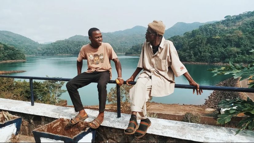 yasmin_tells's tweet photo. Today, Instagram reminded be of this photo I captured last January. These two workers at Guma Dam were discussing the upcoming #AFCON match #SierraLeone were about to play. That’s when I truly understood the power of sports and how it unites people.  
#SaloneTwitter 
#yasmintells https://t.co/zwC1Q5xJmI