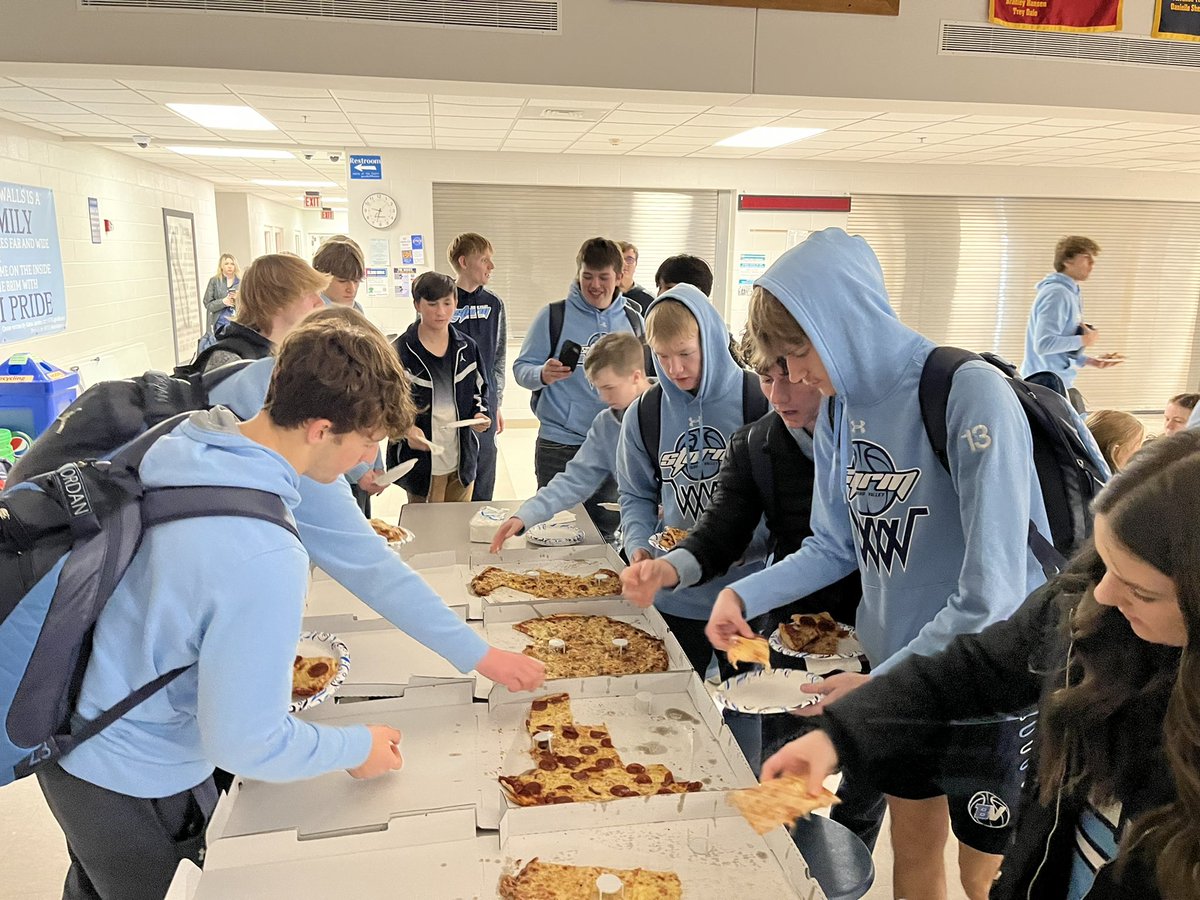 Pizza party after a big win at Kewanee