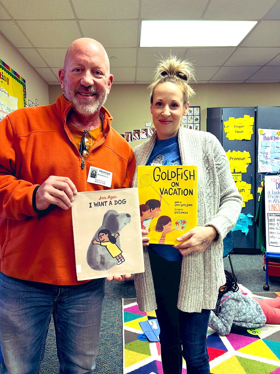 We were so lucky to have a very special Mystery Reader this morning that no one recognized except me! My dad visited TWE today and my two families met! We enjoyed 2 new books: “I Want a Dog” and “Goldfish On Vacation”. I am so thankful for my wonderful dad! <a href="/twehowl/">Tom Wilson Elementary</a>