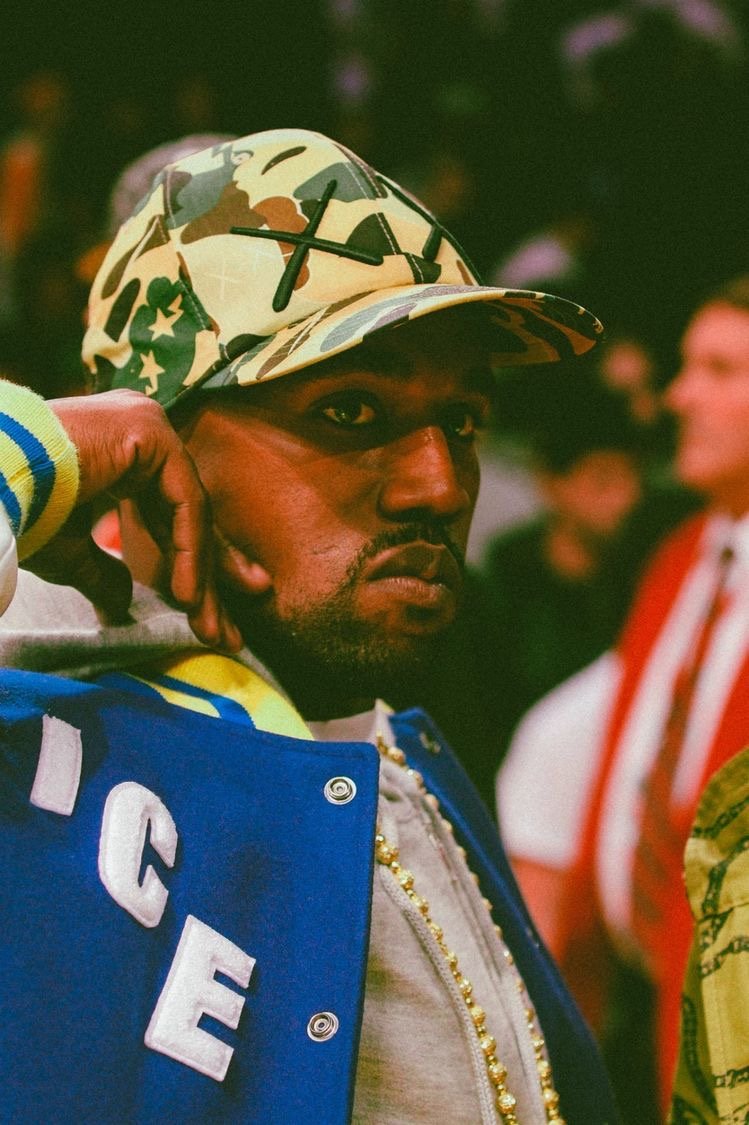 YE back in 2005 wearing Kaws x Bape Hat.
