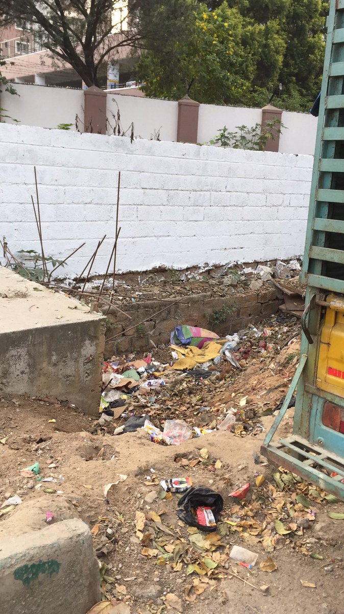 @BBMPCOMM The debris on 5th Main, HSR layout near the unfinished stormwater drain, next to Salarpuria Serenity Apts has not been removed. For over 8 months, the footpath has been in this sorry state. How long should we wait for this to be cleared.