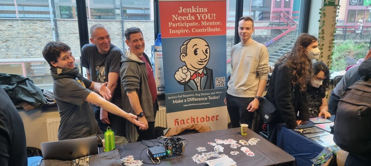 jenkinsci's tweet photo. It's happening now! #Jenkins stand @fosdem is officially open. Visit us in building K level 2! https://t.co/qxcvT3tkG2