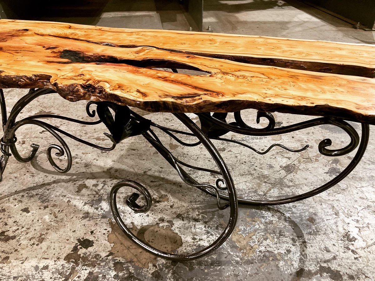 Here at the @britishhardwoods open day till 3pm. Finished my new yew table just in time. Have to say I’m pretty pleased with how it turned out 😊

@craftinfocus  
<a href="/Forest2Furnitur/">Patrick Turk</a> 

#bigblackhousedesign #blacksmith #metal #wood #yew #table #handmade #craft