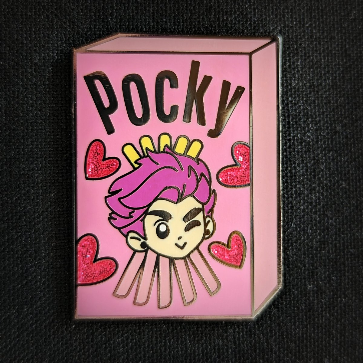 YuuriVoice's tweet photo. Did you miss this once exclusive Pocky Alphonse Valentine's Day pin? You can get yours today! Orders are shipping out now that the Great Texas Freeze has ended, so head over to the store and grab one while they're still in stock! https://t.co/HVFfSXtfUT https://t.co/SIUA08fPjp